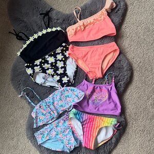 Lot of 4 Girls Bikini Swimsuits.  Size Small 6/7.